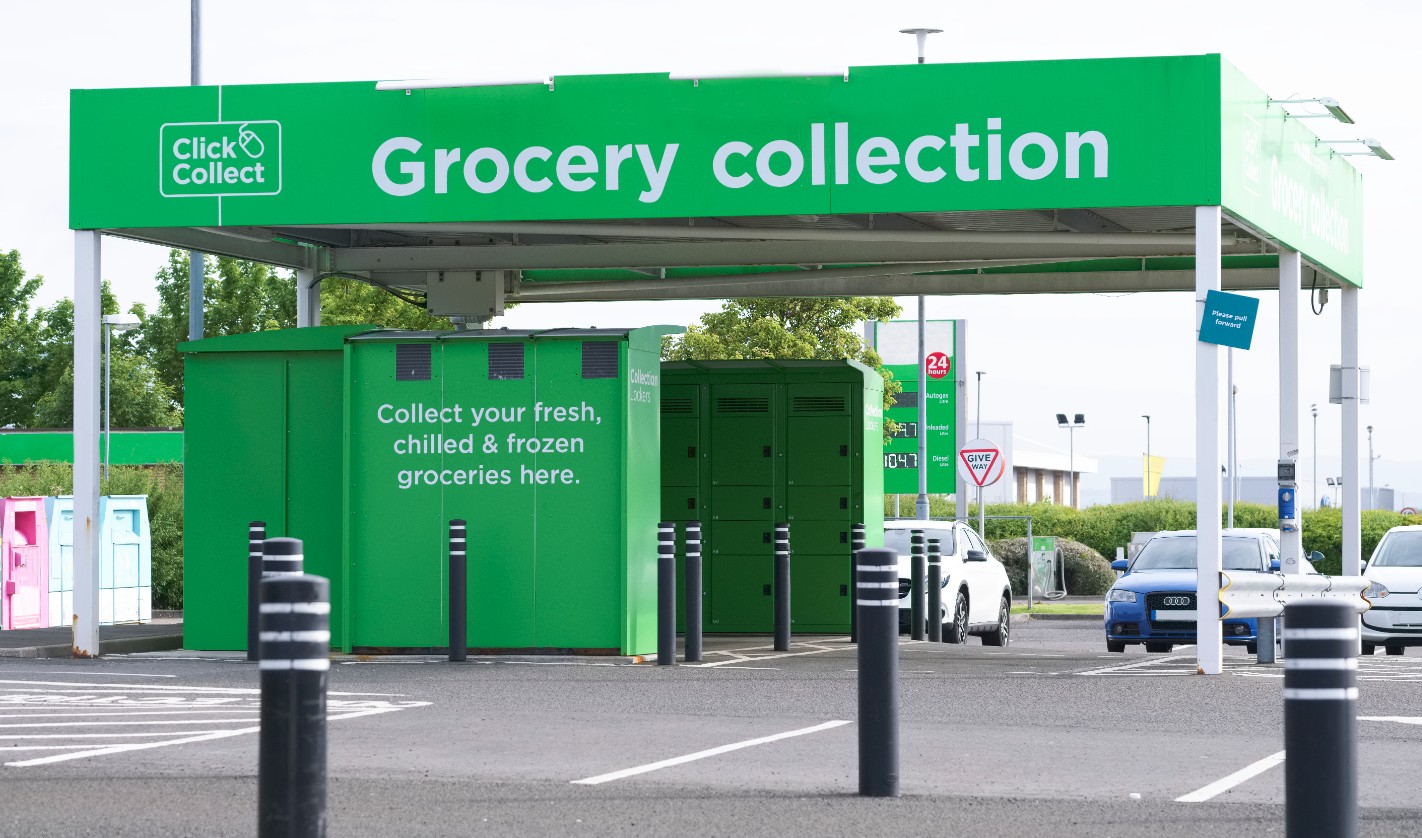 Grocery click and collect bay with cars parked