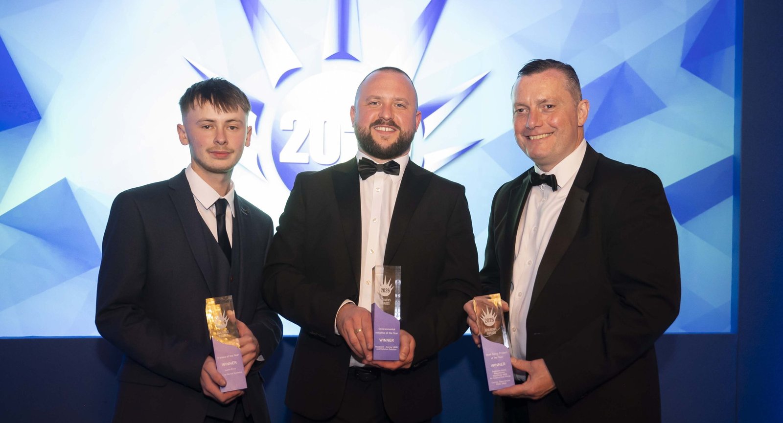 The Roadvent team holding trophies on stage at the ACR News Awards 2026